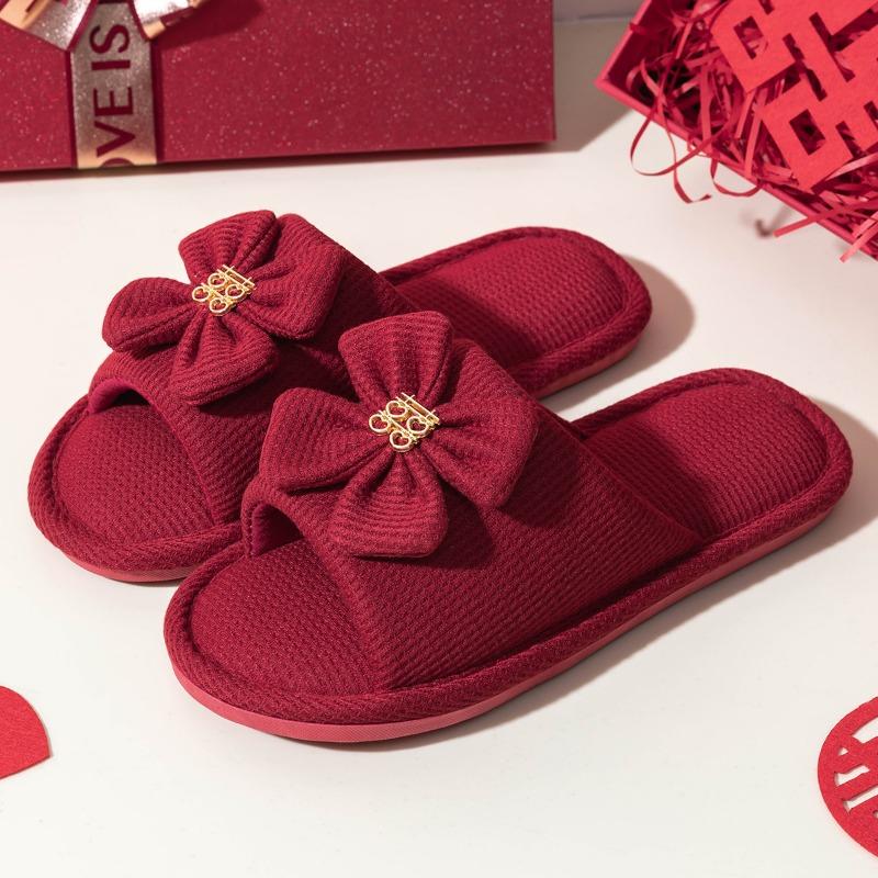 A pair of red wedding slippers autumn and winter light luxury newlyweds festive wedding bride dowry slippers groom