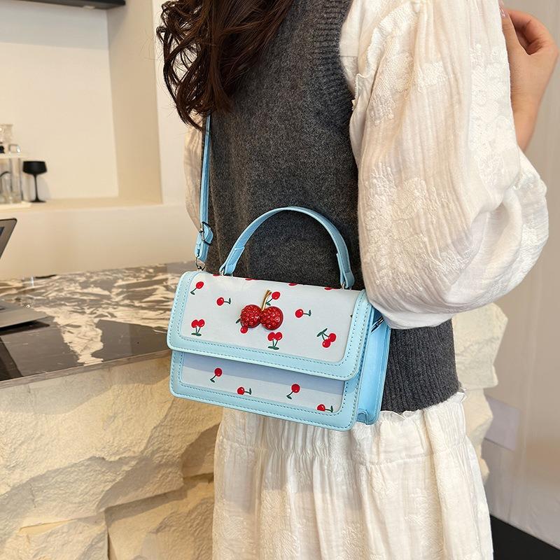 New cute cherry printed messenger bag twist portable small square bag splicing contrasting color design shoulder bag tide