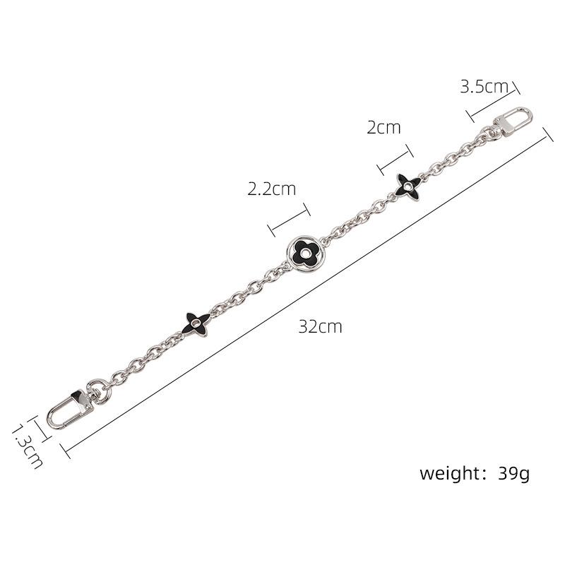 

Розкішний декоративний ремінець для сумки та брелок у вигляді чотирилистої конюшини