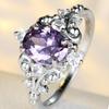 Elegant formal occasion halo ring with a curved metal frame and dazzling inlay details, a high-end accessory for women's engagement ceremonies and