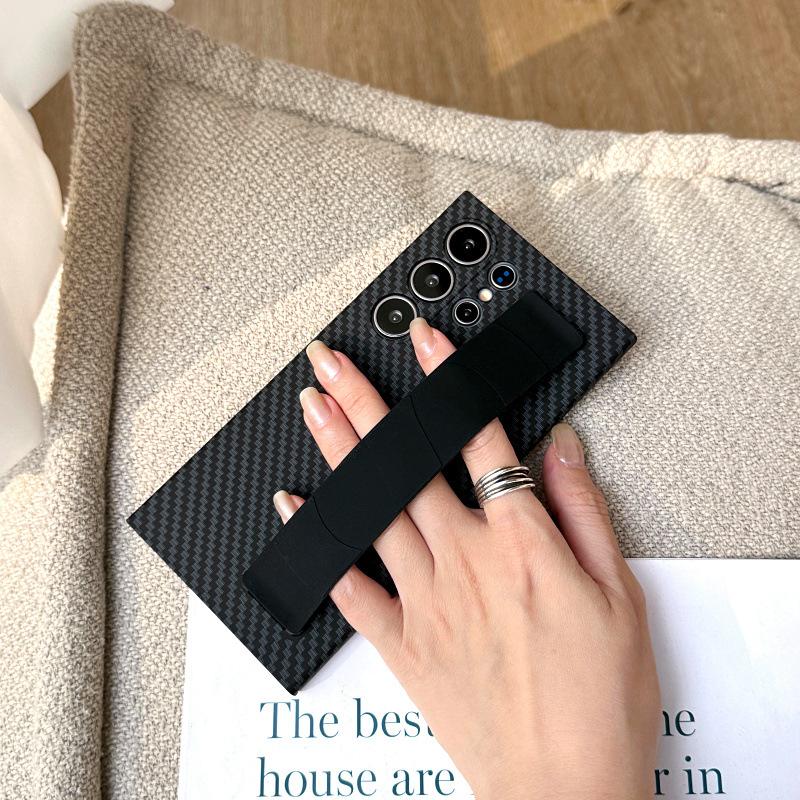 Suitable for Samsung S24ultra Elastic Wristband Mobile Phone Case S24 Carbon Fiber S25ultra Anti Fall S23 Protective Case