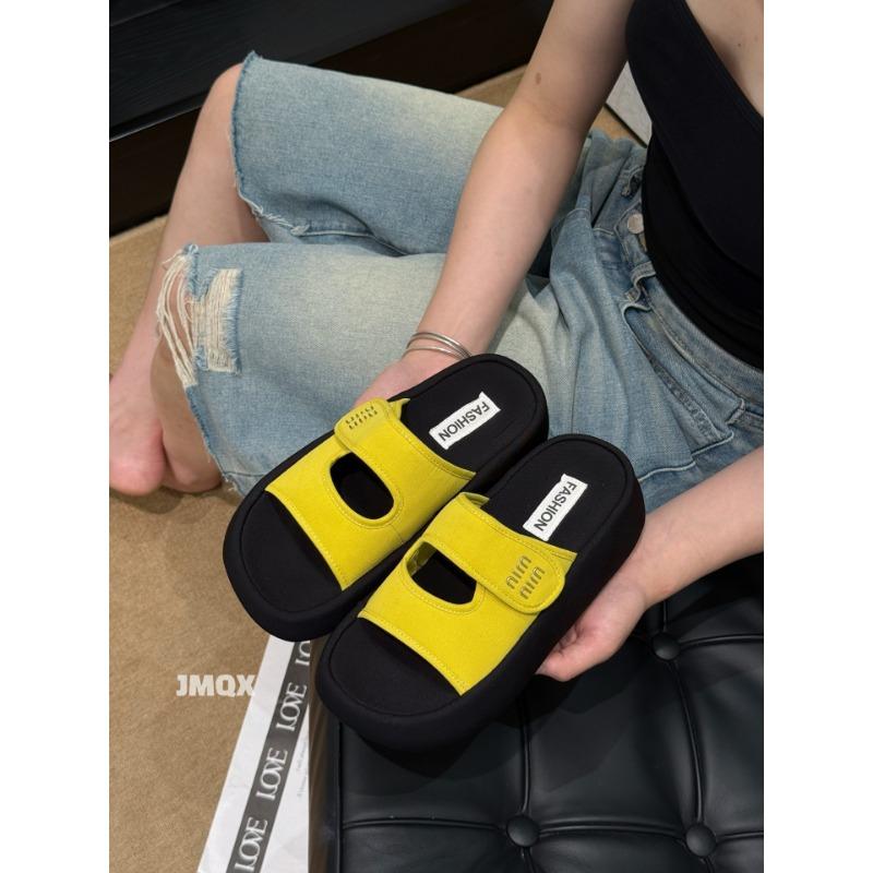 

Summer new thick-soled one-word slippers women wear versatile muffin bottom beach cool slippers 39 жовтий