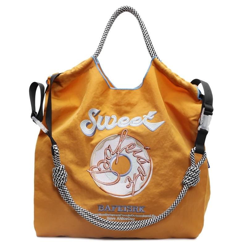 Fashion Solid Exquisite Embroidery Donut Sweet Shoulder Bags for Women 2026 Hot Sale Large Capacity Portable Elegant Tote Bags
