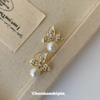 Light Luxury Camellia Design Stud Earrings Women's Fashion Pearl Earrings Without Ear Clips Versatile Mosquito Coil Disc Earrings
