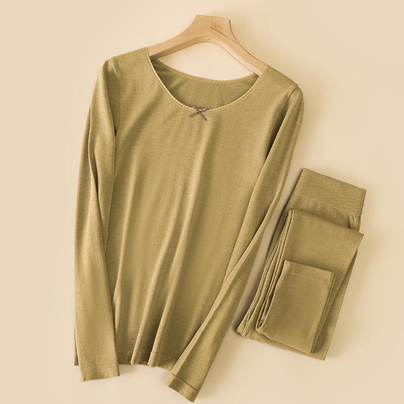 

Комплект женского термобелья из шерсти - бесшовный, легкий, теплый, с длинным рукавом, круглым вырезом и брюками для осени и зимы One Size