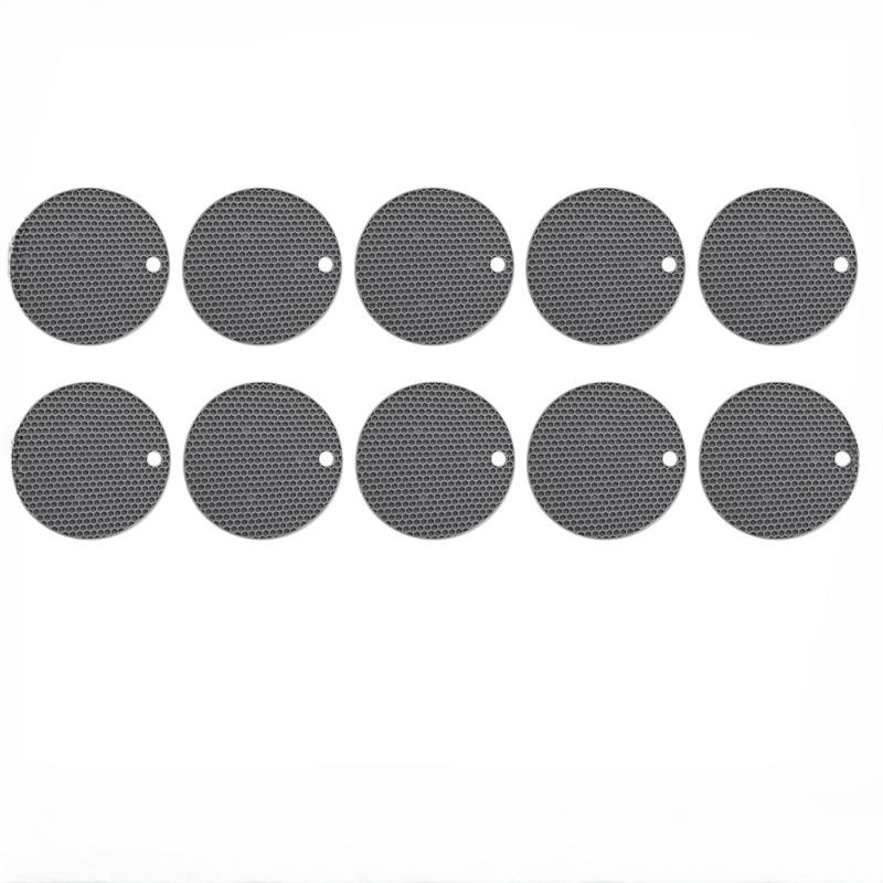 10 stilvolle und praktische Matten in Wabenform. Hitzebeständiger Untersetzer aus Silikon. Schützen Sie Ihre Arbeitsplatten mit diesem stilvollen Tischset.