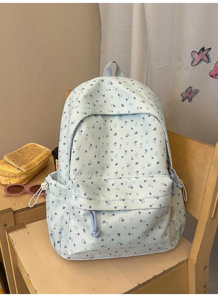 Schulrucksack große Kapazität Schulrucksack Mittelschule Oberschule Schüler Freizeit neue Version Koreanischer kleiner floraler Rucksack Studenten Reise