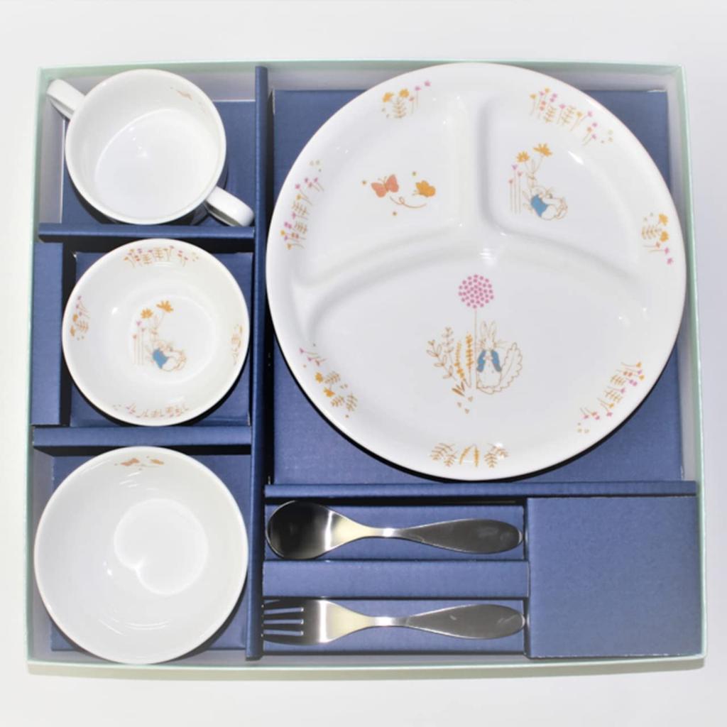 This porcelain lunch small and fork set features a Peter Rabbit adventure Easy for children to eat with and easy for adults to this Mino ware set is