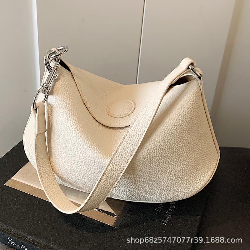 Niche design dumpling armpit bag 2025 summer new shoulder messenger bag high-end versatile lychee pattern saddle bag