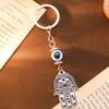 Retro Ethnic Style Fatima Palm Keychain Tribal Style Devil'S Eye Dripping Oil Hollow Pendant