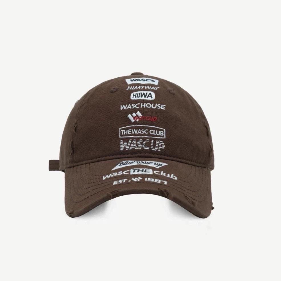 A Female Soft Top  Heavily Distressed  Embroidered Letter Couple Baseball Hat  and A Male with A Smaller Face