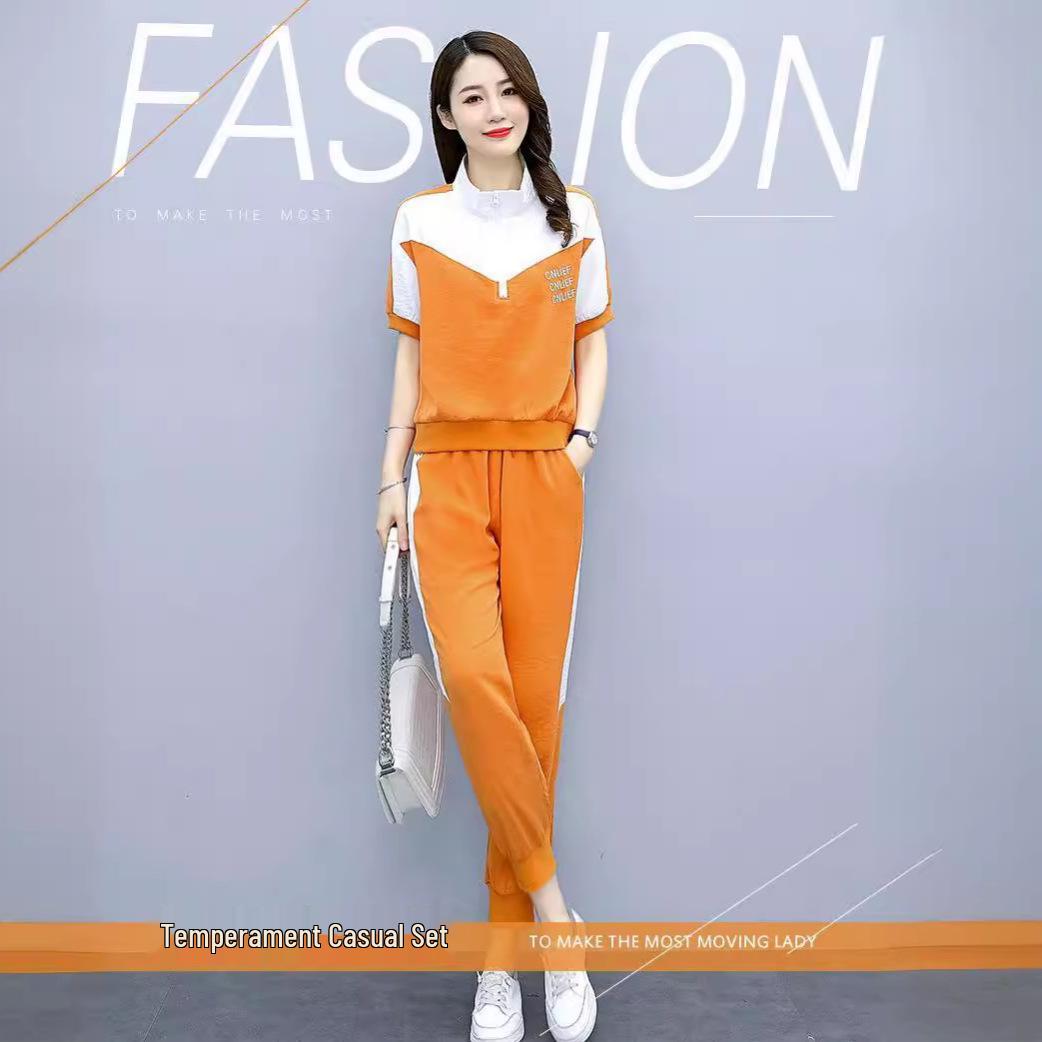

Женская модная летняя спортивная одежда: Комплект из двух предметов: топ с коротким рукавом на молнии до середины и укороченные брюки-джоггеры XXL оранжевый