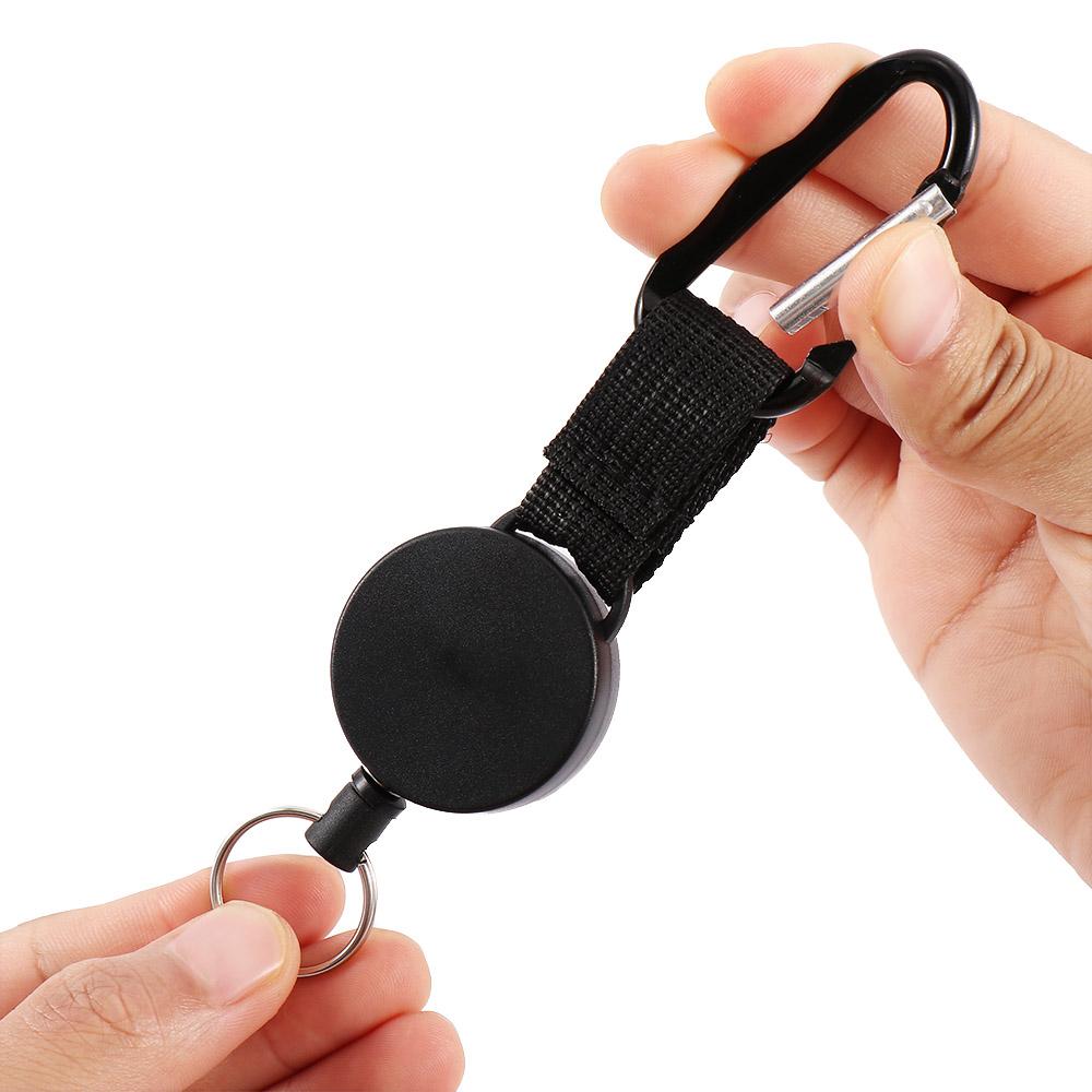 

Recoil Reel easy pull buckle Extends To 60cm nylon rope Key Ring high elastic tension Carabiner чёрный