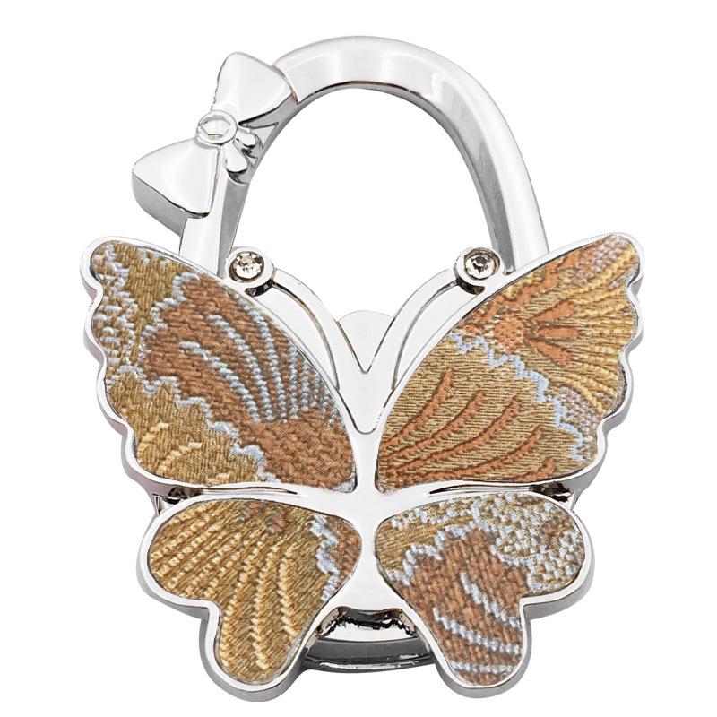 Large Matte Butterfly Hanging Bag Hook - Foldable Women's Bag Buckle & Portable Table Edge Hook for Luggage Accessories.