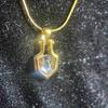 Pendant shield with inlay of meteorite Pallasite Sericho Kenya with olivine 10184 mm on chain 55 cm titanium steel gift box COA certificate