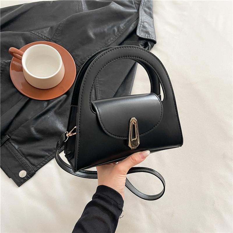 2025 summer new semi-round bag women's solid color retro lock handbag trendy foreign feeling casual messenger bag