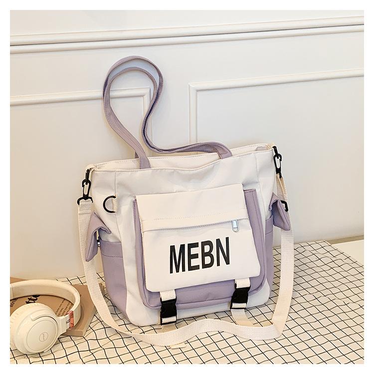 

Весенняя новая холщовая сумка, японская простая сумка-тоут большой вместимости, сумка для книг, студенческая сумка через плечо для репетиторства на занятиях фиолетовый