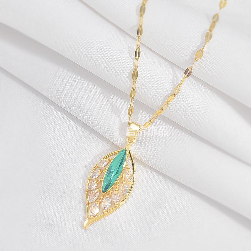 

Titanium Steel Golden Branches And Jade Leaves Necklace Women S High-End Sense Simple And Versatile Temperament Shining Zircon Pendant