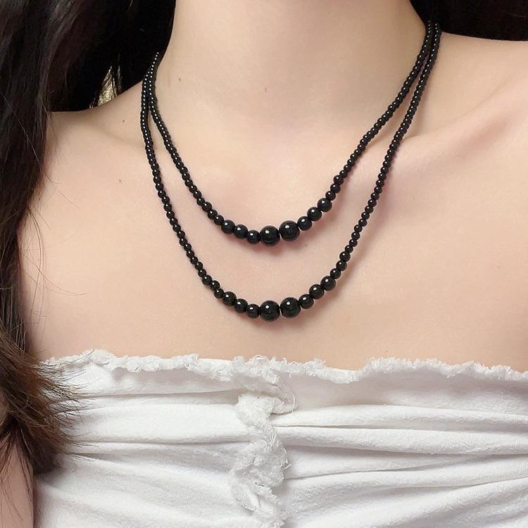 Irregular multi-layer stacking wearing long pearl necklace French light luxury temperament sweater chain simple high-end neck chain tide