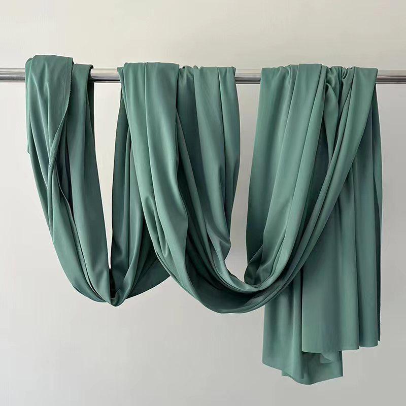 Green Stretch Milk Silk Fabric for Wedding and Hotel Drapes