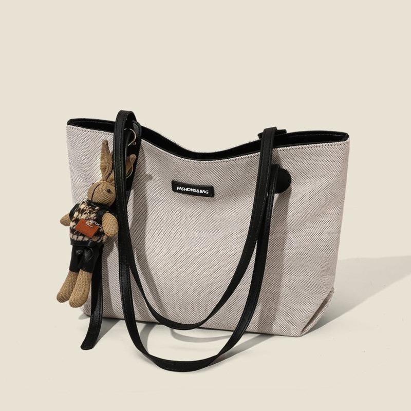 Casual large-capacity bag women's bag spring and summer new versatile canvas bag commuter shoulder bag simple tote bag