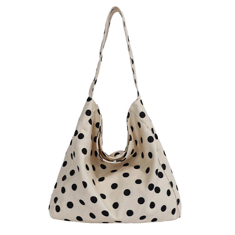 2026 Chic Polka Dot Underarm Bag: Korean Style, Versatile Women's Handbag with Unique Design.