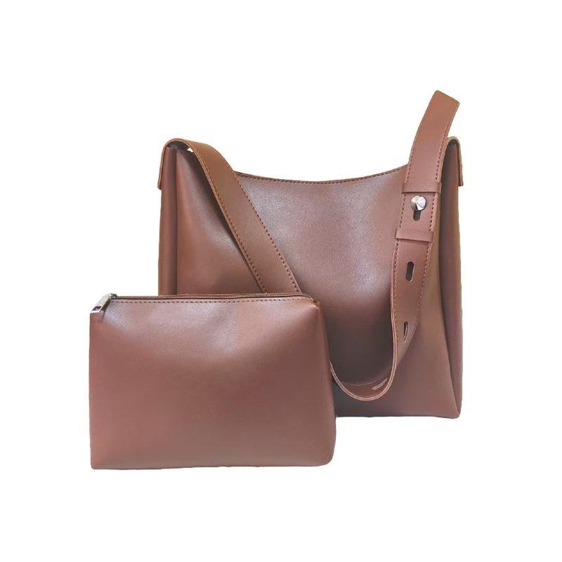 Large-capacity commuter bag women's spring new child and mother bag retro fashion soft leather shoulder bag portable tote bag