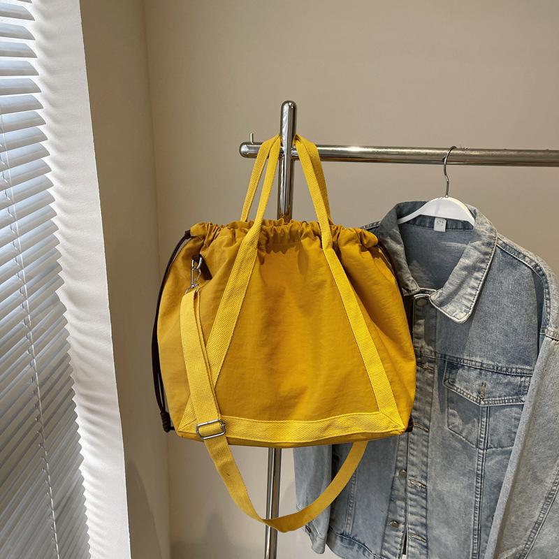 Large Capacity Bag Women's New Summer Casual Messenger Bag Portable Drawstring Folds Class Tote Bag