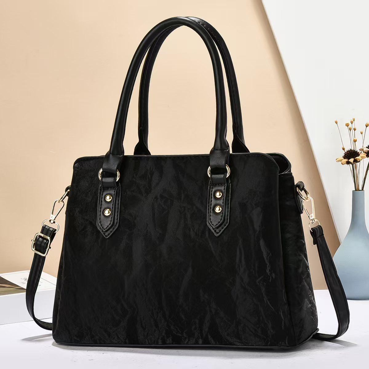 

Korean version of the large capacity senior sense of durability fashion exquisite lightweight commuting outdoor beach crossbody shoulder handbag кавовий