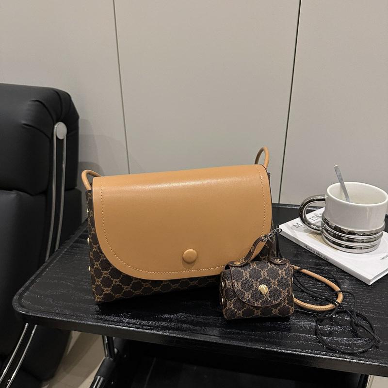 

Foreign style spring new versatile fashion mother and child bag female Korean version contrasting color retro casual personalized commuter messenger b