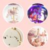 Snow globe music box with colored LED lights, merry-go-round, crystal ball, and automatic snowfall. Popular as a birthday or Christmas gift for girls,