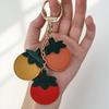 Kreativer Tomaten-Anhänger PU-Leder Oranger Schlüsselanhänger Modischer Obst-Schlüsselanhänger Rucksack-Dekoration