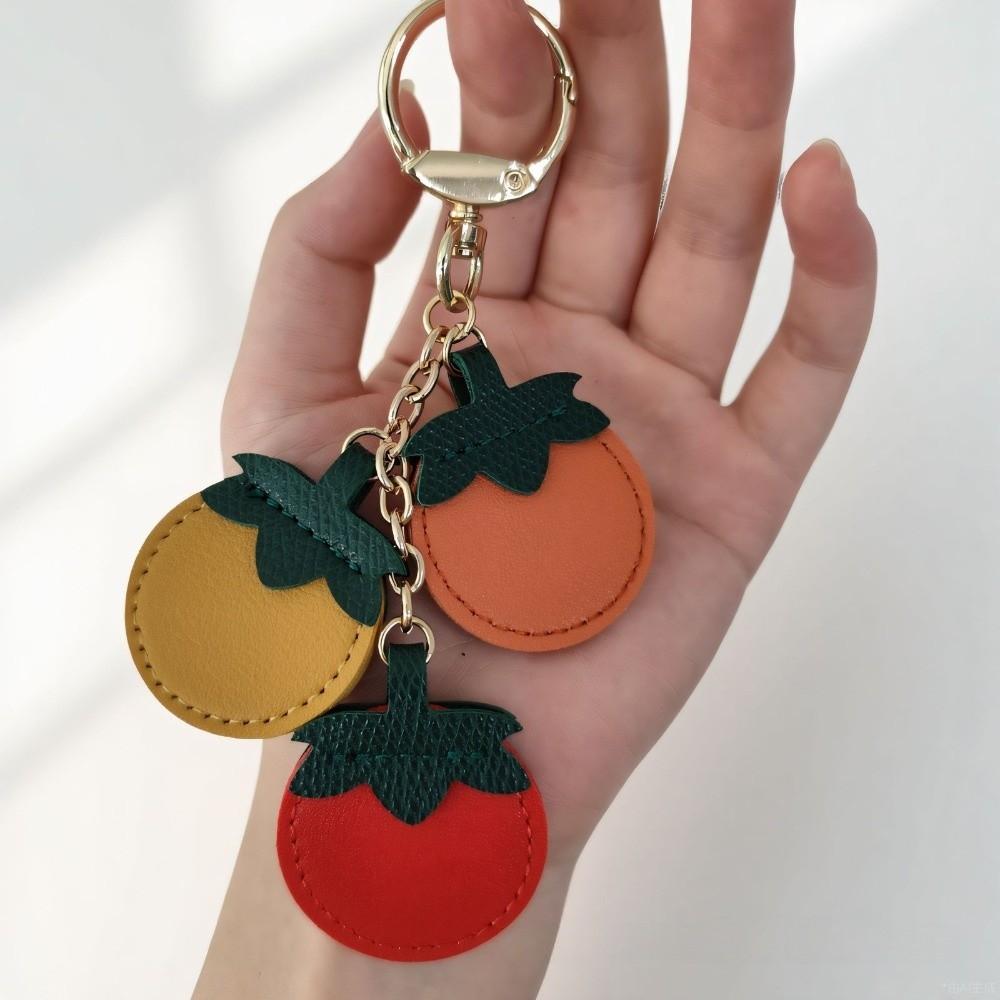 Kreativer Tomaten-Anhänger PU-Leder Oranger Schlüsselanhänger Modischer Obst-Schlüsselanhänger Rucksack-Dekoration