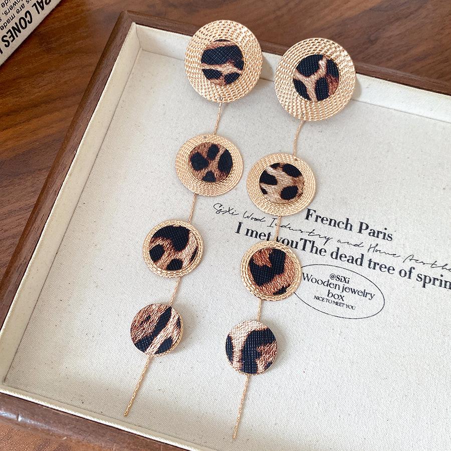 Steel needle round texture leather leopard print fringed earrings European and American exaggerated personality earrings light luxury earrings