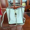 Women's Retro Rivet Cowhide Bucket Bag with Leopard Head Design