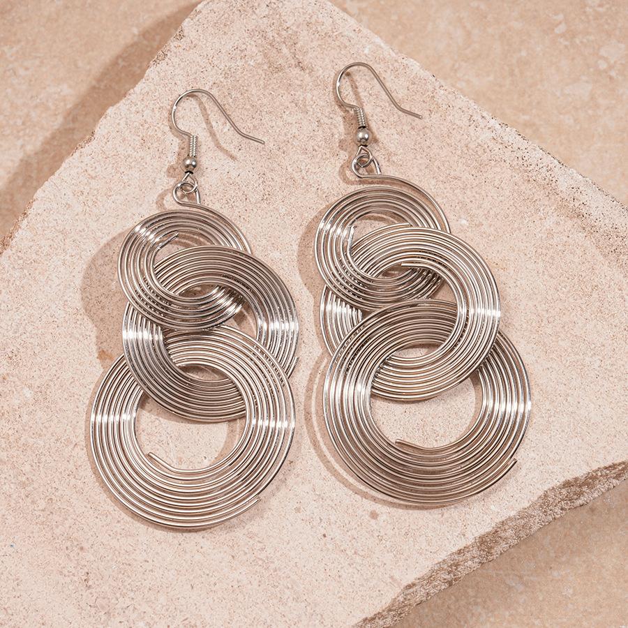 

Hollow Geometric Round Wrapped Tassel Ear Hook Unique High-end Earrings срібний