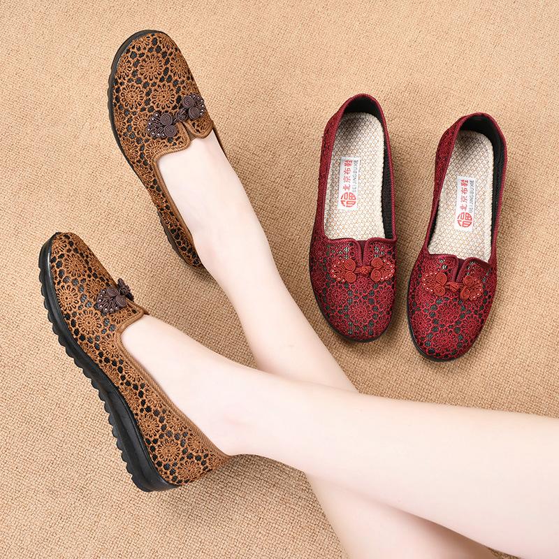 Summer new cloth shoes women's flying woven hollow breathable medium and old soft sole one pedal casual shoes