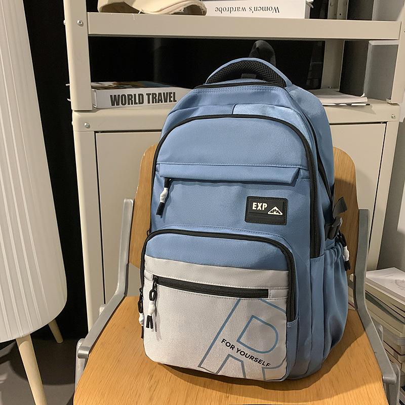 High value trendy cool letter backpack couple contrasting colors simple and lightweight travel mountaineering backpack