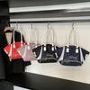 2025 new niche design letter versatile portable tote bag leisure commuting shoulder handbag wholesale