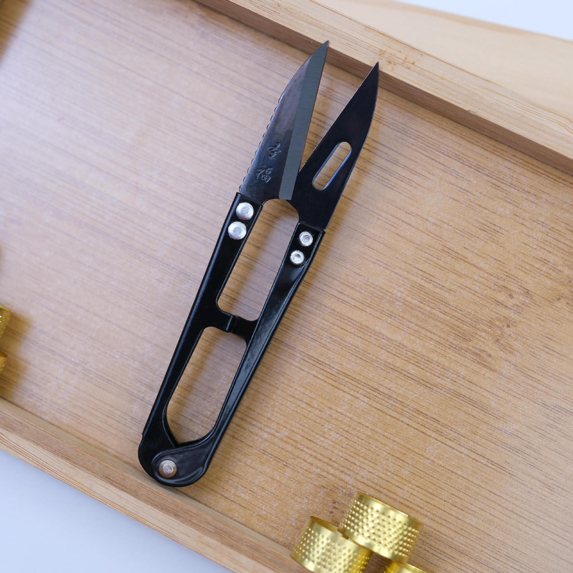 

U-shaped High Carbon Steel Spring Yarn Scissors - Perforated, Toothed Design for Cross Stitch and Sewing.