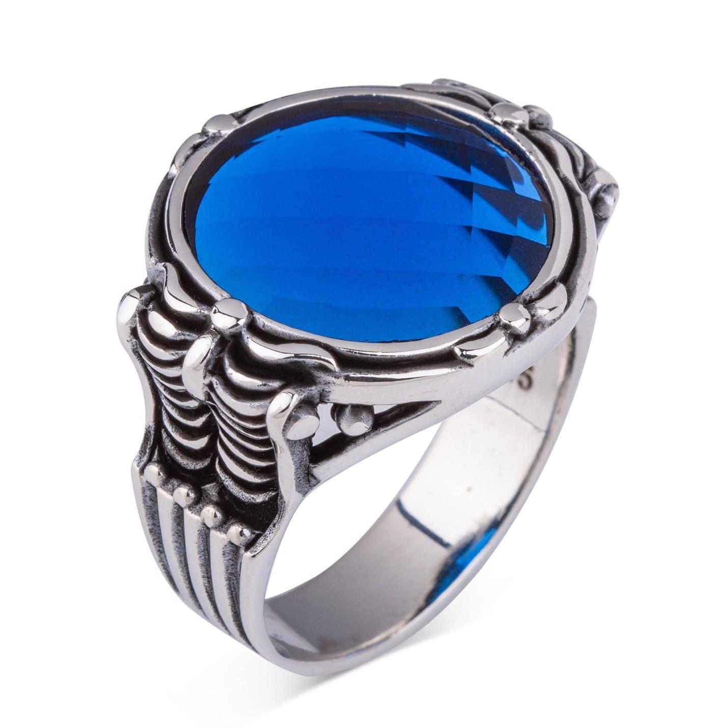 

Мужское кольцо из стерлингового серебра с египетской короной и синим цирконом