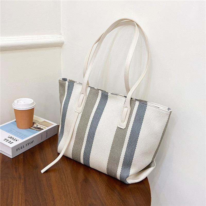 Simple commuting versatile large capacity canvas bag with high aesthetic value single shoulder cloth bag