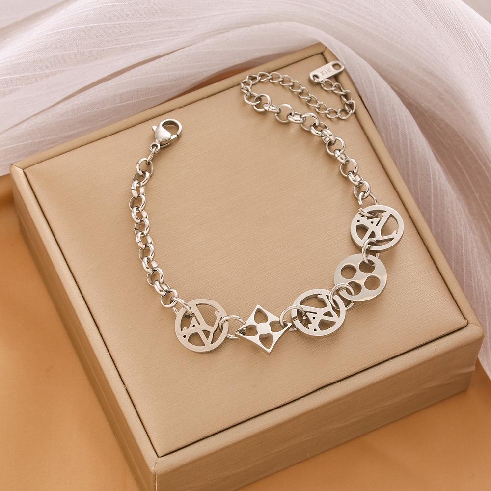 High-End Titanium Steel Four-Leaf Clover Bracelet with Shell Pendant – Durable, Fade-Resistant Design