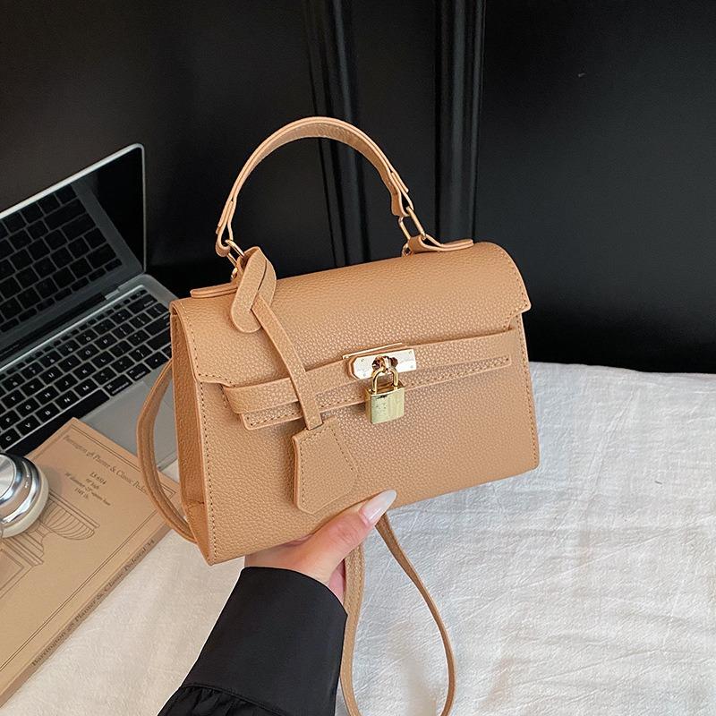 High-end women's handheld Kelly bag new trendy spring and summer bag fashion niche design crossbody bag