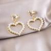 Elegant Pearl Heart and Triangle Ear Clips - No Piercing Needed, Trendy and Versatile Earrings for Women