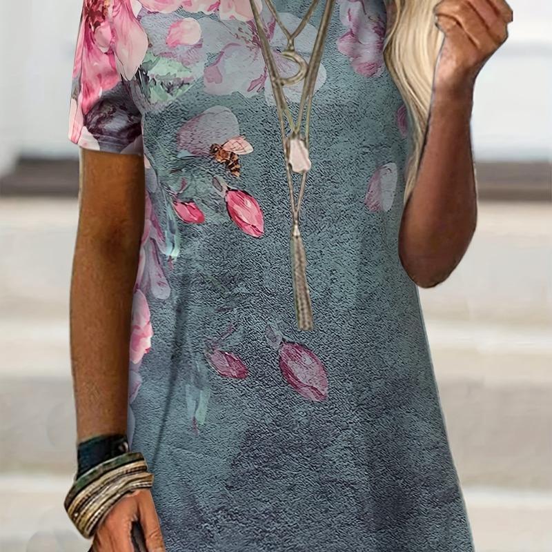 Nueva moda primavera y verano camiseta casual de manga corta con estampado floral [direccional]