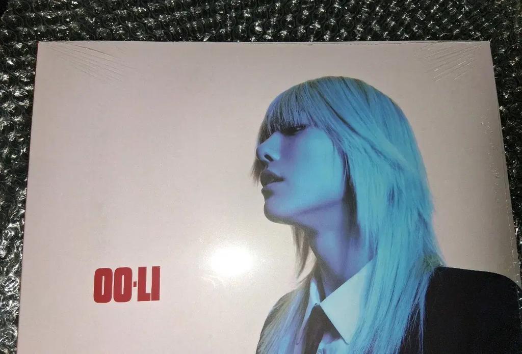 Woodz Cho Seung-yeon LP, neotevřené, zapečetěné, s bonusovými předměty.