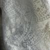 Retro patterned tattoo fabric with base of floral design suitable for wedding dresses formal gowns and designer clothing fabrics