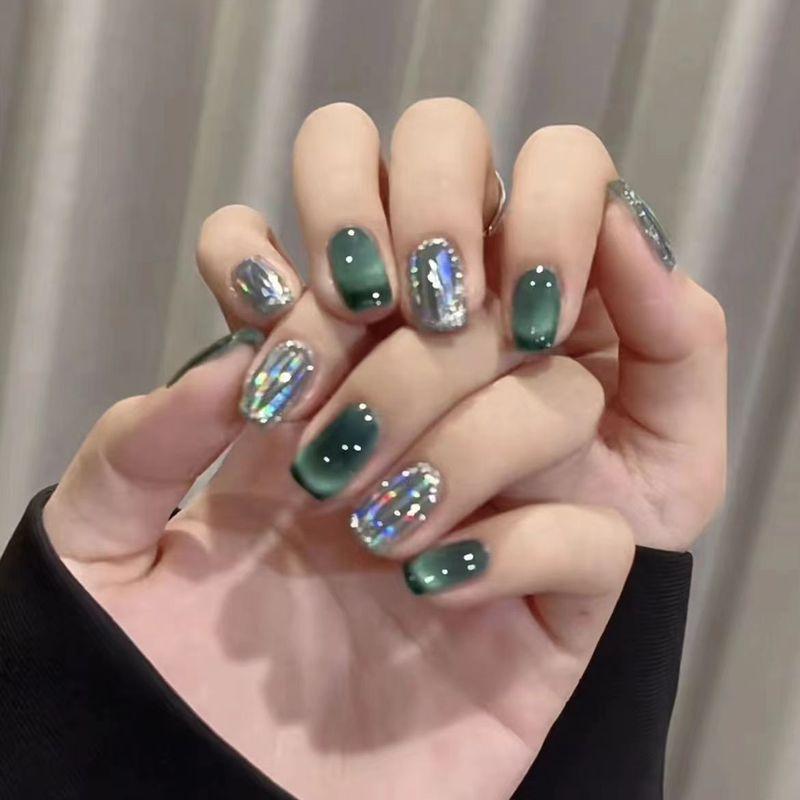 

Ретро Изумрудно-зеленый Кошачий глаз Ручная работа Носимая броня Осень и Зима Белый Флэш Стекло Бумага Наклейки для ногтей Накладные ногти XS