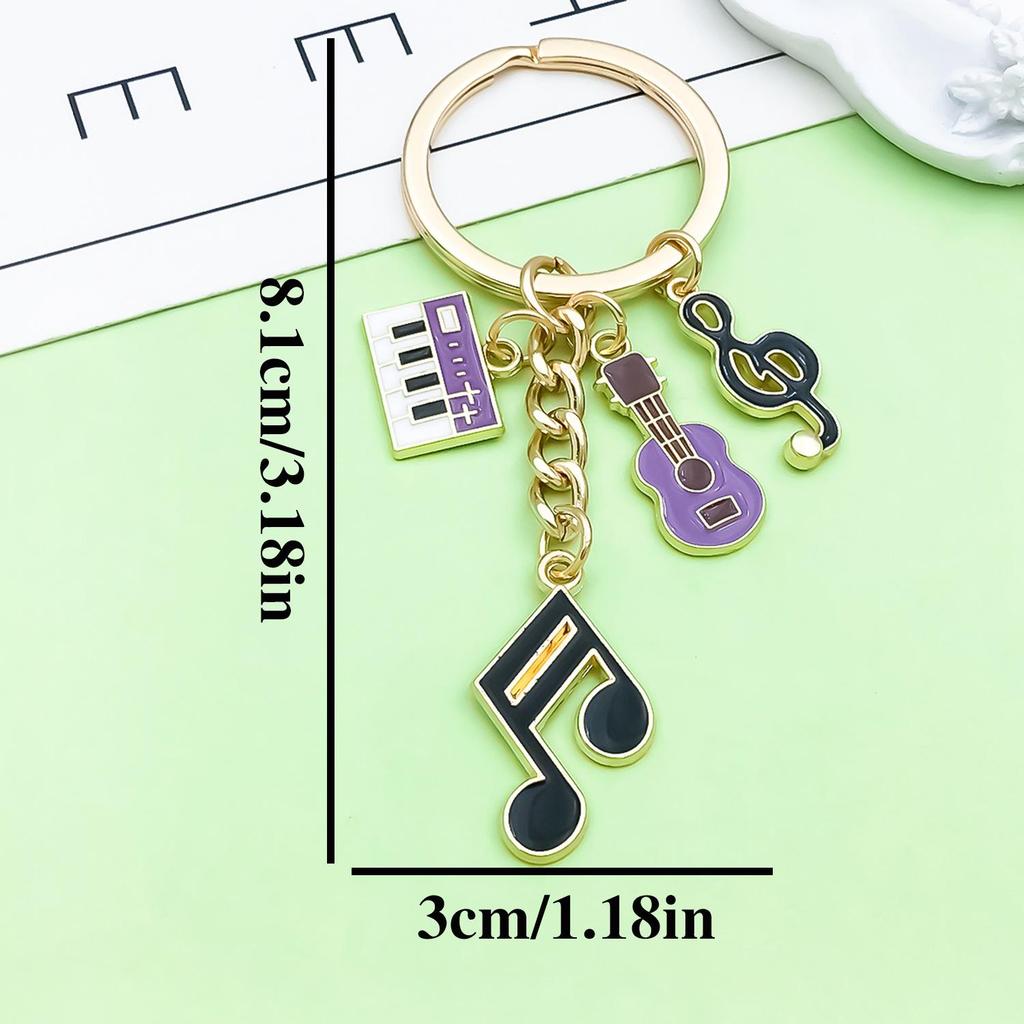 Antique Silver Music Cassette & Saxophone Keychain with Creative Design